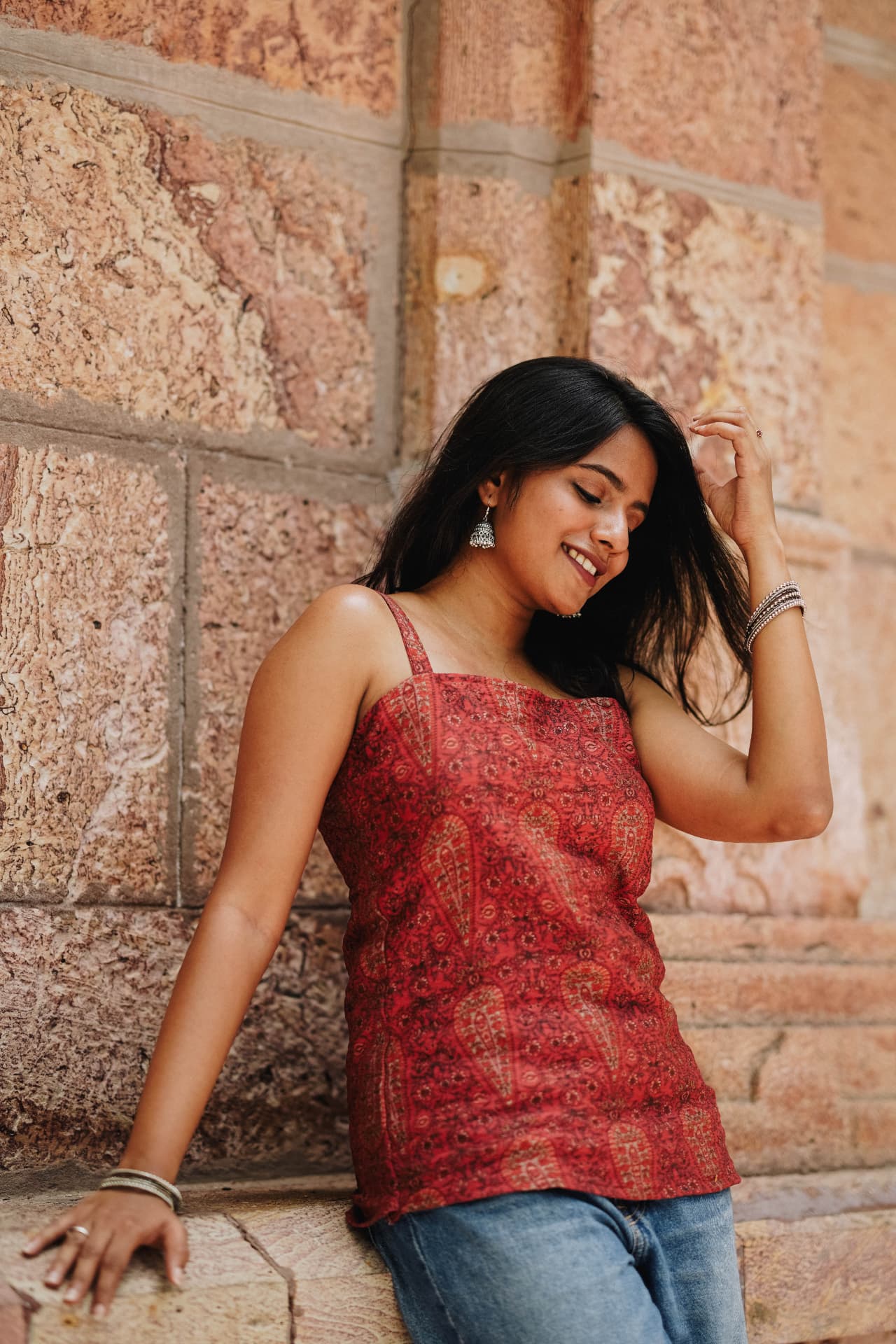Detail of the rust paisley print and lace-up back.